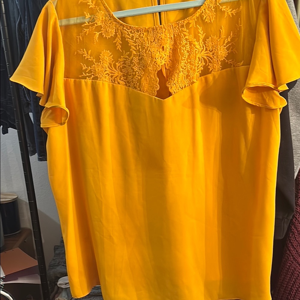 Yellow blouse with flutter sleeves embellished cut out